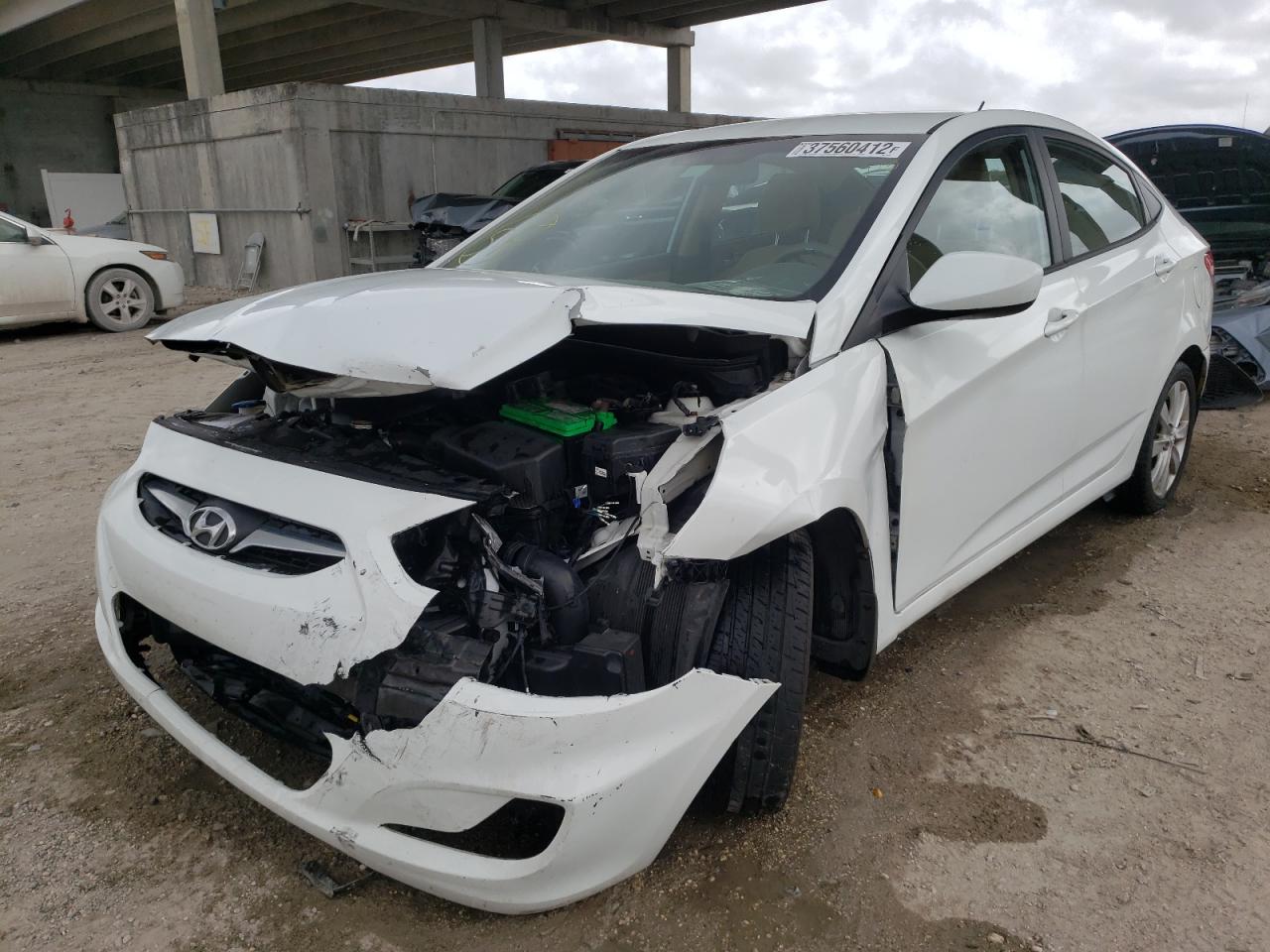 Photo 2 from auction – 2014 HYUNDAI ACCENT GLS with VIN KMHCU4AE8EU764693