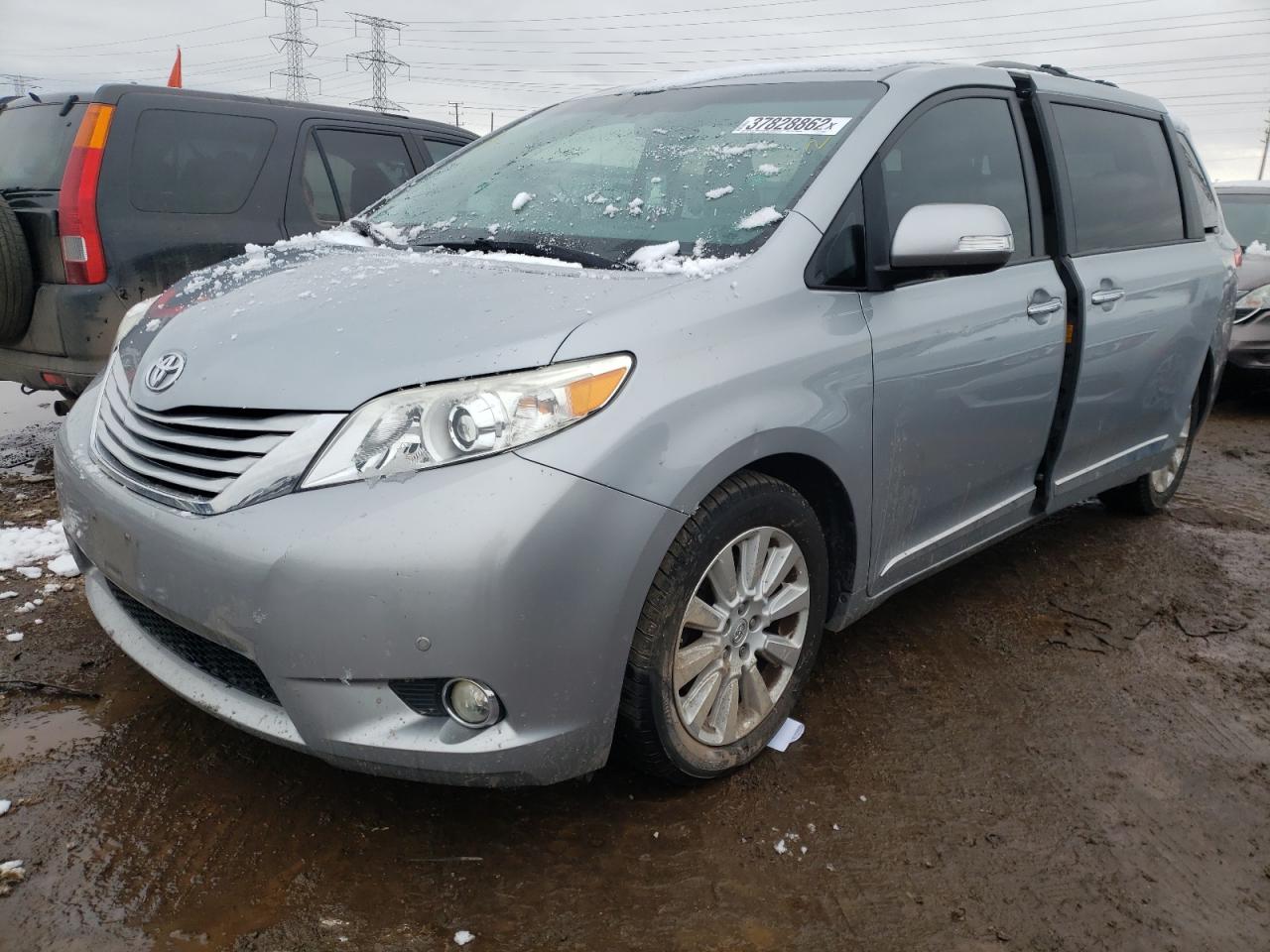 Photo 2 from auction – 2014 TOYOTA SIENNA XLE with VIN 5TDYK3DC3ES451611