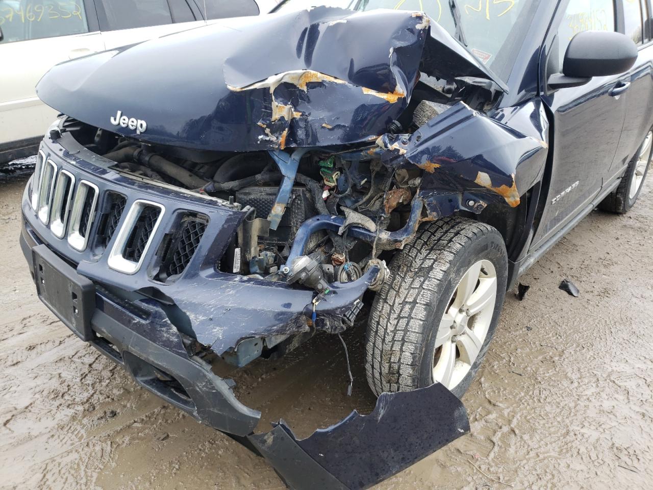 Photo 9 from auction – 2014 JEEP COMPASS SP with VIN 1C4NJDBB8ED642085