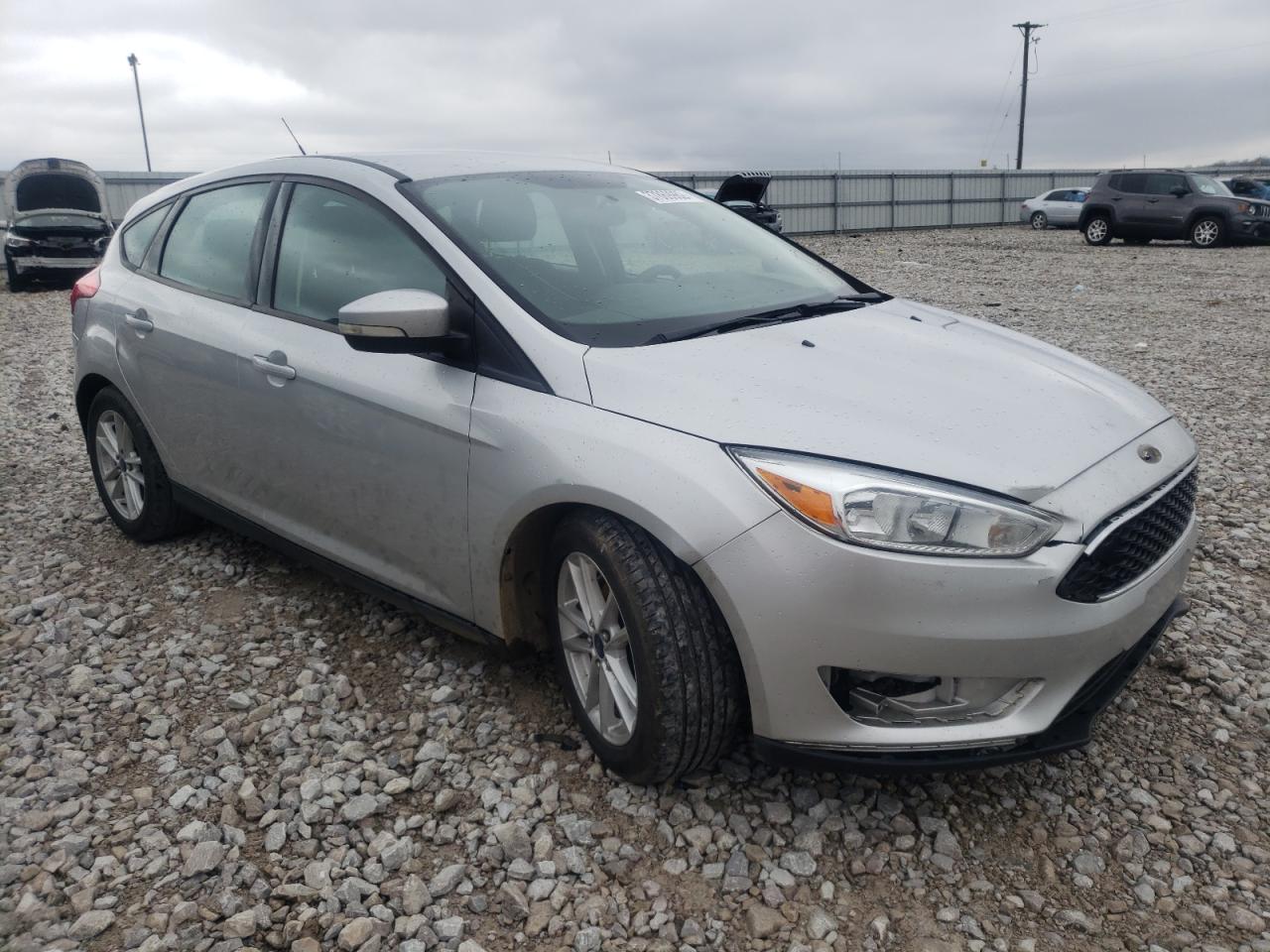 FORD FOCUS SE 2015 with VIN 1FADP3K26FL223881 - Photo from auction