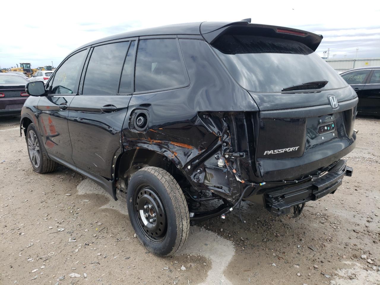 Photo 3 from auction – 2021 HONDA PASSPORT E with VIN 5FNYF7H53MB010586
