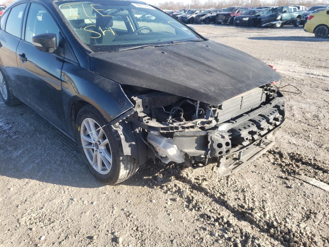 Photo 9 from auction – 2015 FORD FOCUS SE with VIN 1FADP3K20FL223438