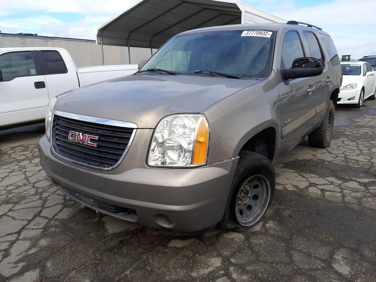Photo 2 from auction – 2007 GMC YUKON with VIN 1GKFK13077J299954