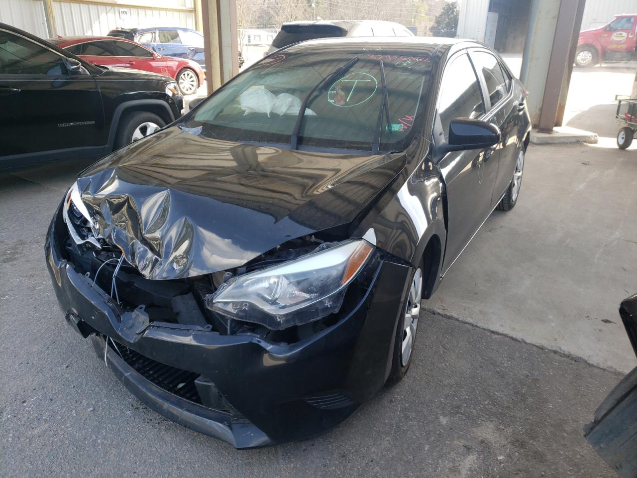 Photo 2 from auction – 2016 TOYOTA COROLLA L with VIN 5YFBURHEXGP393975