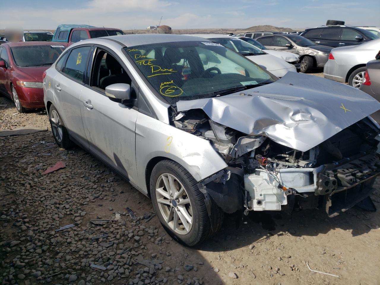 FORD FOCUS SE 2015 with VIN 1FADP3F20FL341208 - Photo from auction