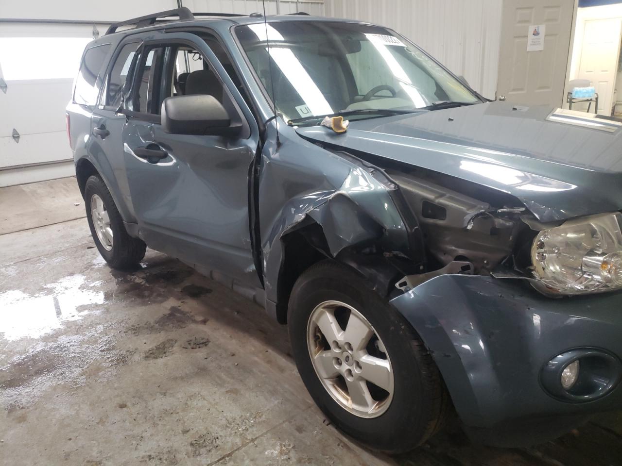 Photo 9 from auction – 2012 FORD ESCAPE XLT with VIN 1FMCU0DG5CKA92980