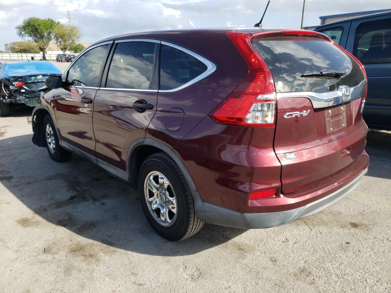 Photo 3 from auction – 2015 HONDA CR-V LX with VIN 2HKRM3H36FH548334