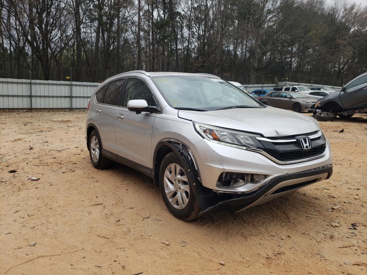 Photo 1 from auction – 2015 HONDA CR-V EXL with VIN 2HKRM3H79FH505352