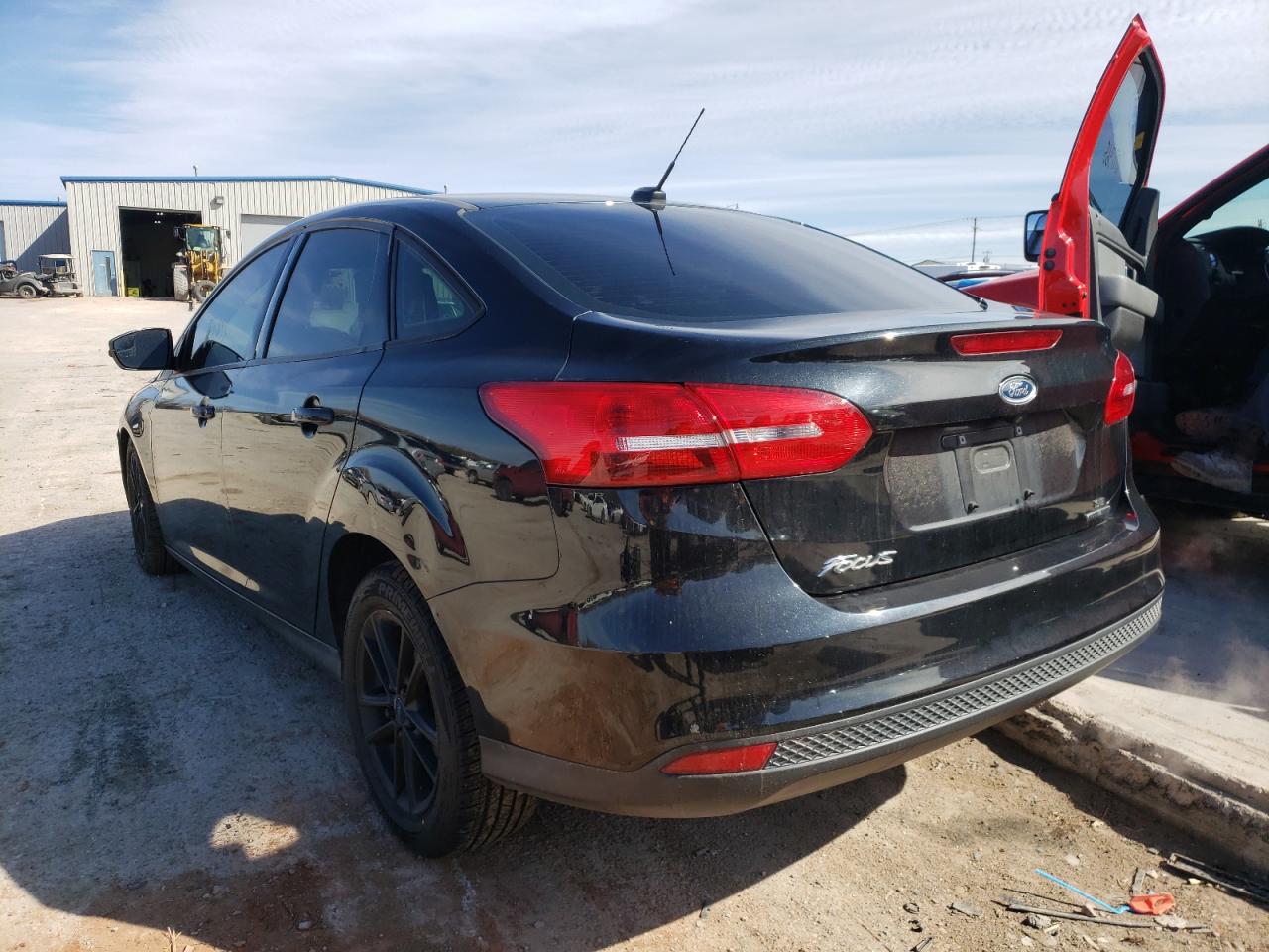 Photo 3 from auction – 2015 FORD FOCUS SE with VIN 1FADP3F25FL385351