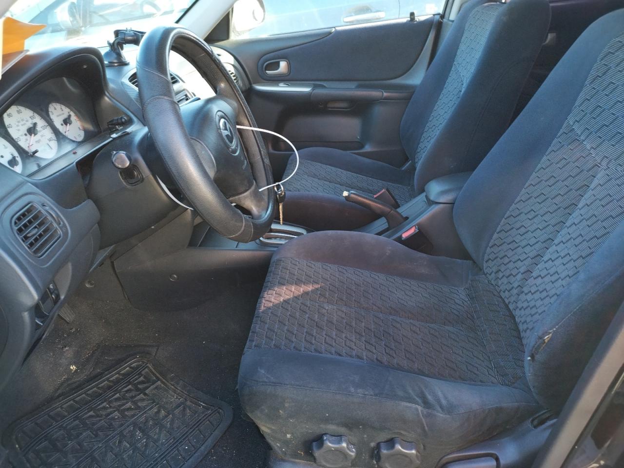 Photo 5 from auction – 2002 MAZDA PROTEGE with VIN JM1BJ226421578473