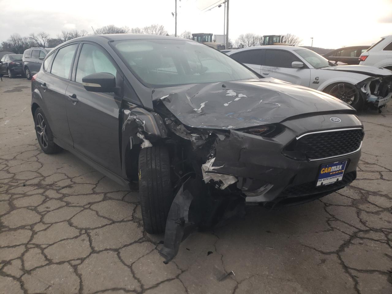 FORD FOCUS SE 2015 with VIN 1FADP3K21FL378256 - Photo from auction