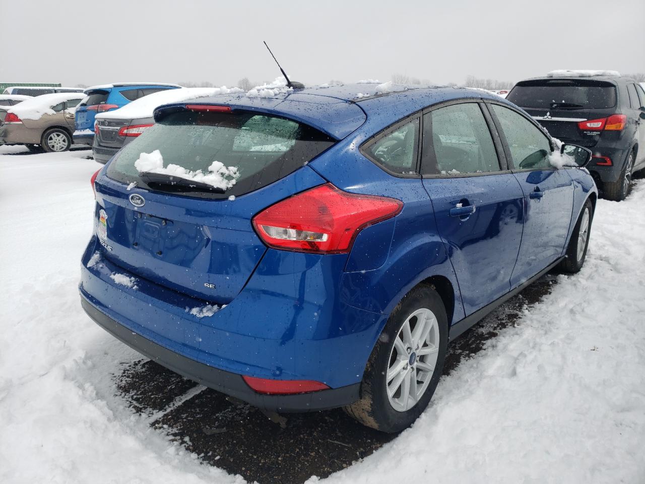 Photo 4 from auction – 2018 FORD FOCUS SE with VIN 1FADP3K21JL209797