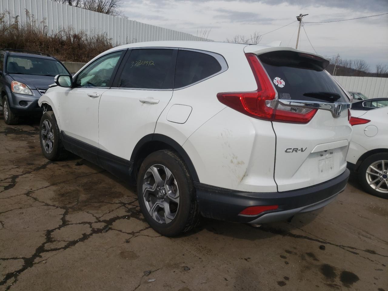 Photo 3 from auction – 2019 HONDA CR-V with VIN 2HKRW2H89KH661561