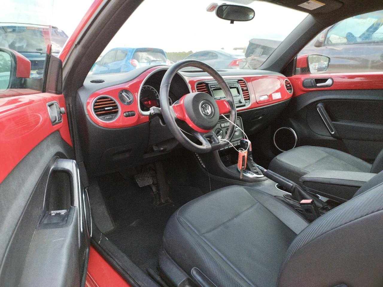 Photo 9 from auction – 2013 VOLKSWAGEN BEETLE with VIN 3VWJX7AT0DM691502