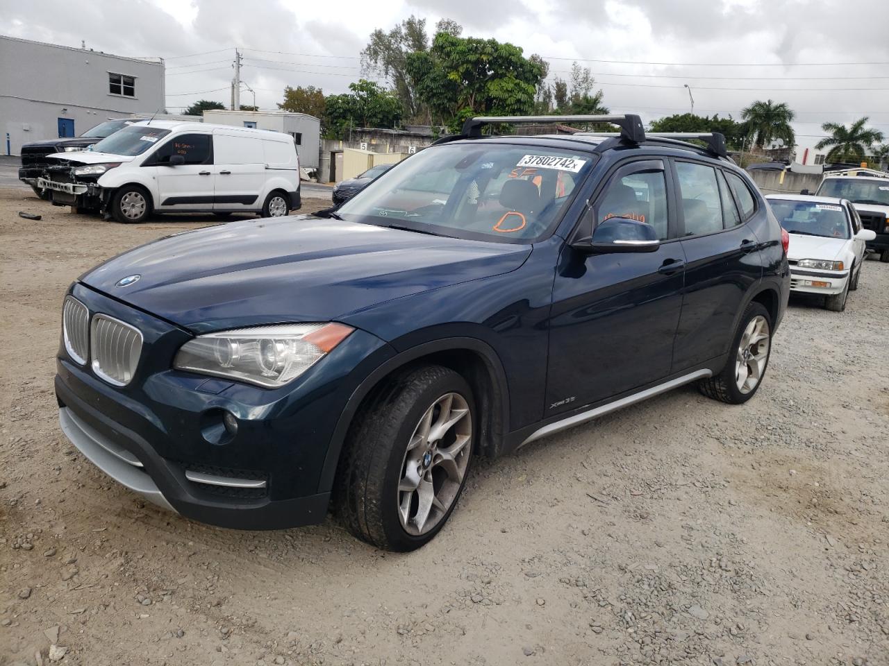 Photo 2 from auction – 2013 BMW X1 XDRIVE3 with VIN WBAVM5C55DVL63608