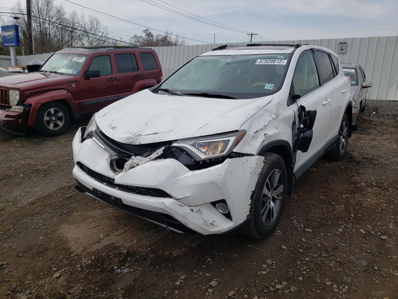 Photo 2 from auction – 2018 TOYOTA RAV4 ADVEN with VIN 2T3RFREV4JW732868