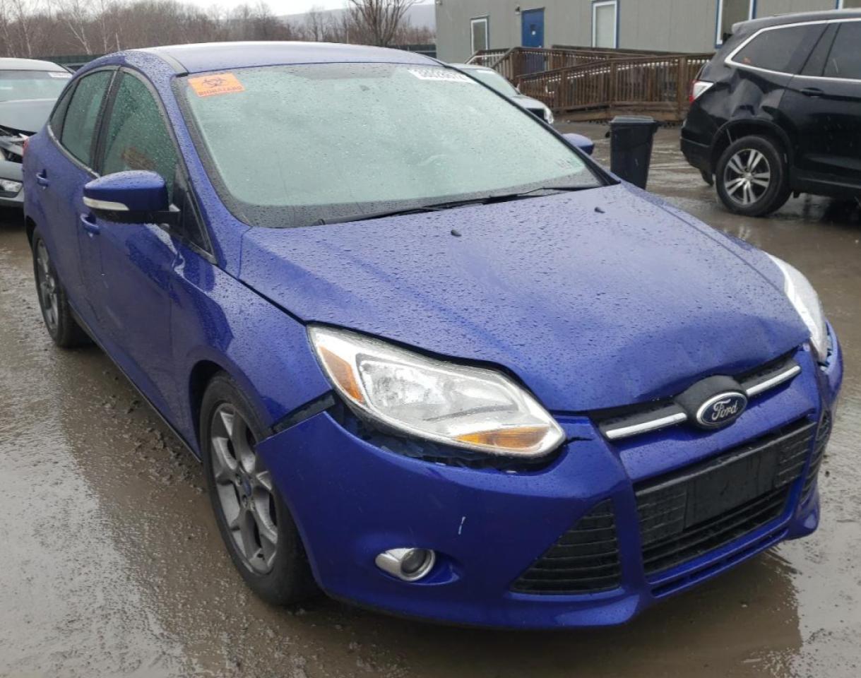FORD FOCUS SE 2014 with VIN 1FADP3F24EL215643 - Photo from auction