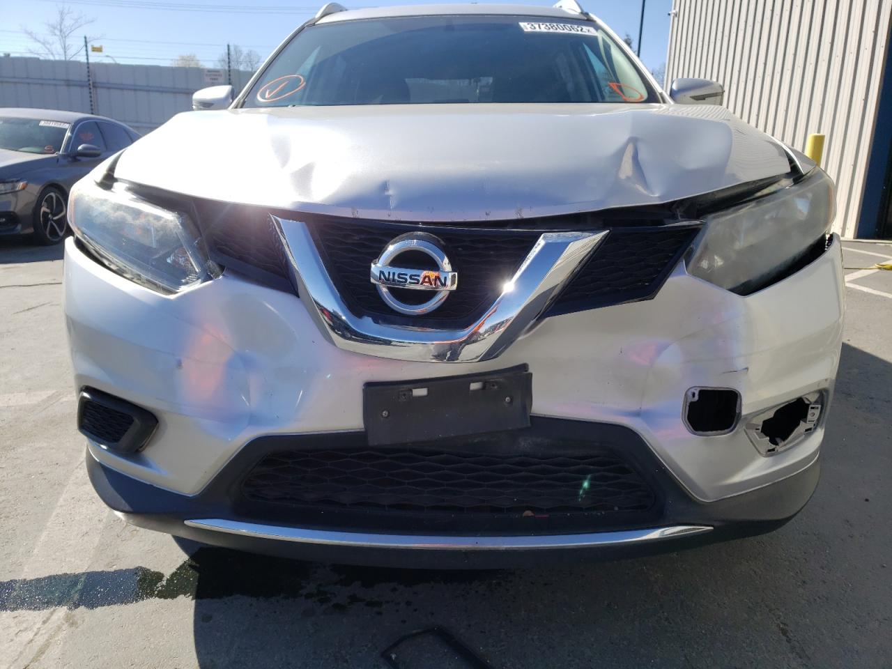 Photo 9 from auction – 2016 NISSAN ROGUE S with VIN JN8AT2MV0GW148674