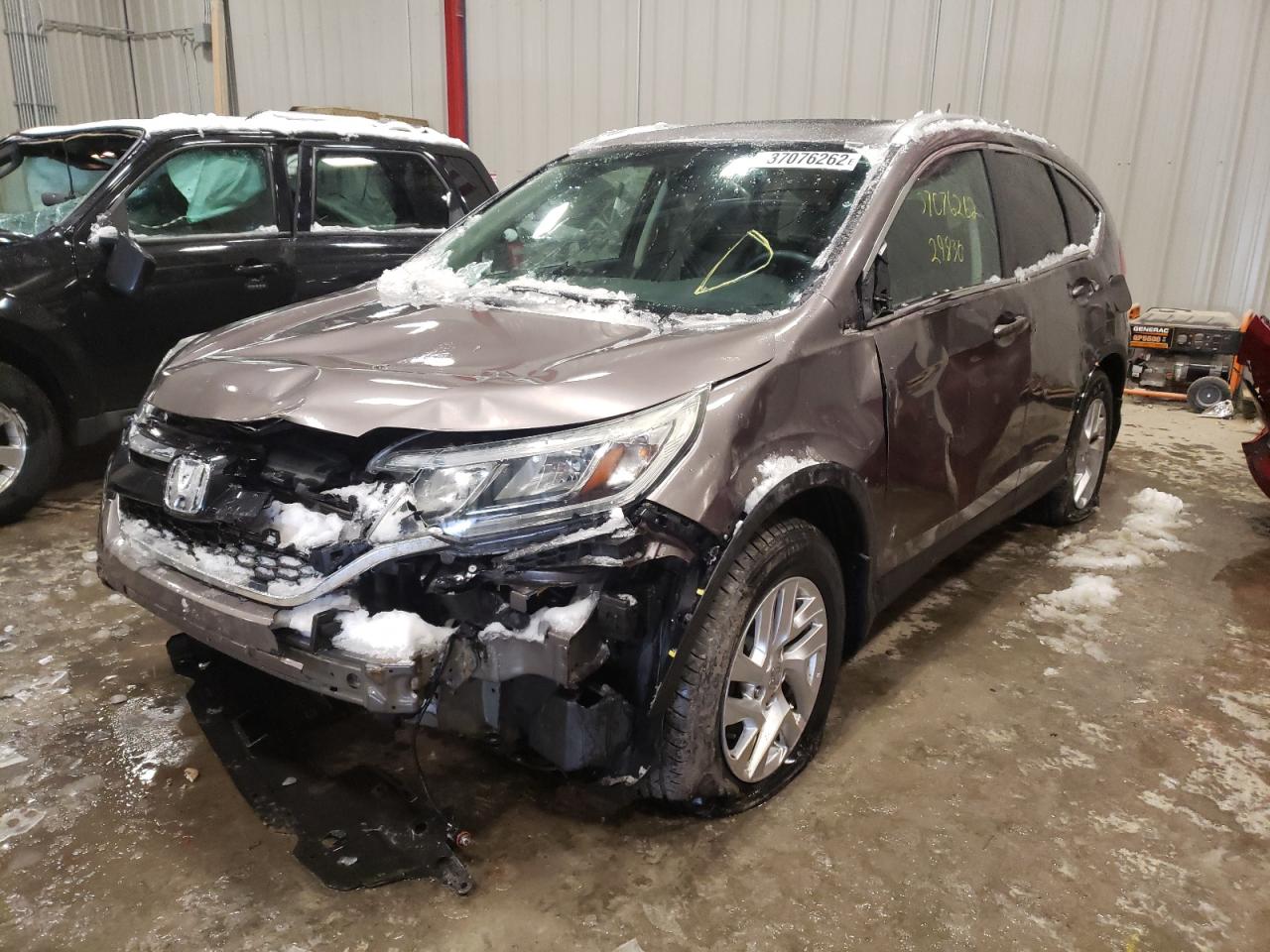 Photo 2 from auction – 2015 HONDA CR-V EXL with VIN 5J6RM4H77FL000079