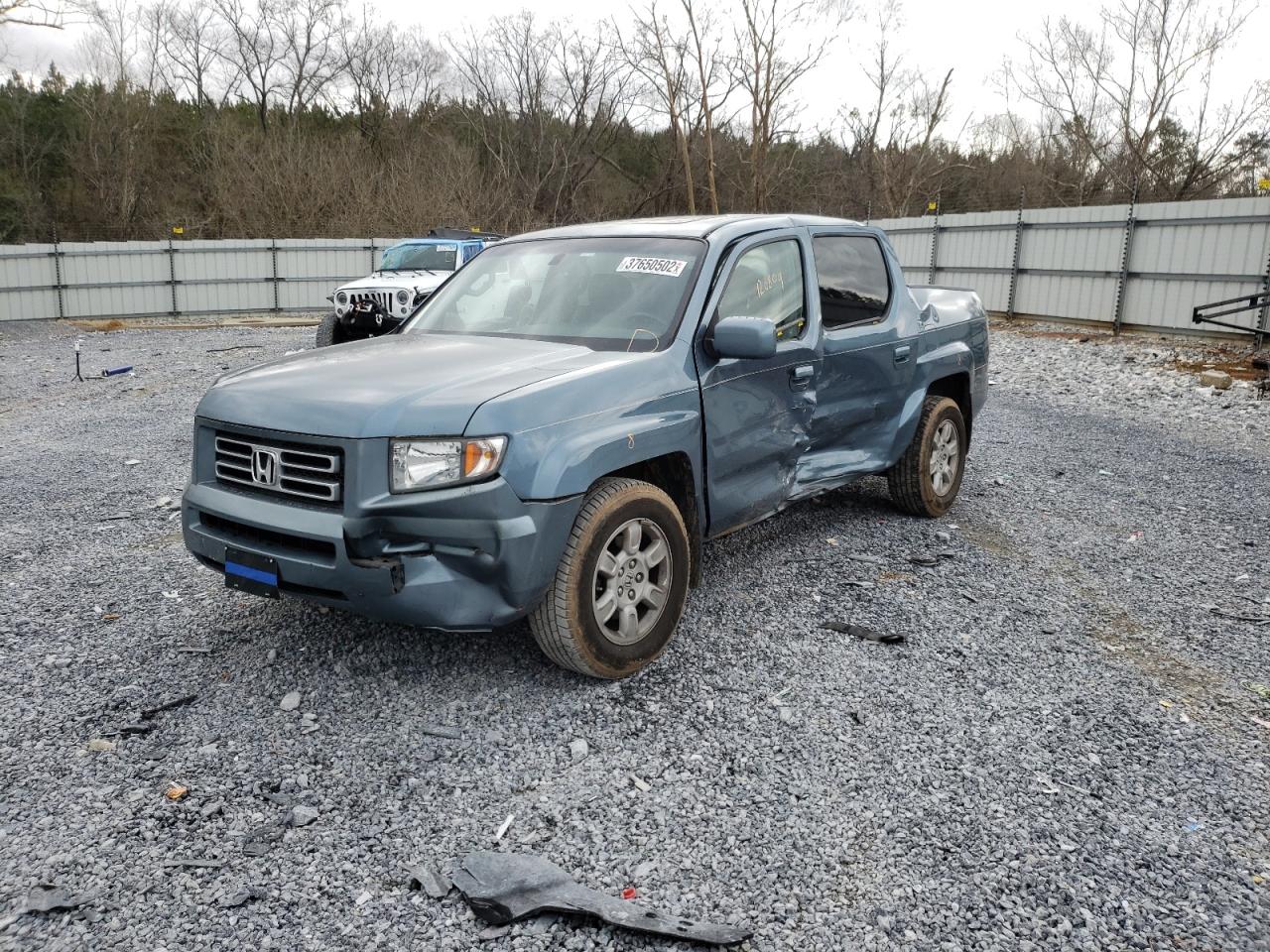 Photo 9 from auction – 2007 HONDA RIDGELINE with VIN 2HJYK16557H534554