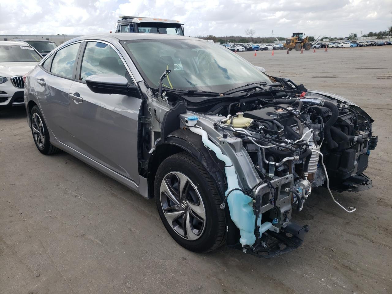 HONDA CIVIC LX 2020 with VIN 19XFC2F62LE022408 - Photo from auction