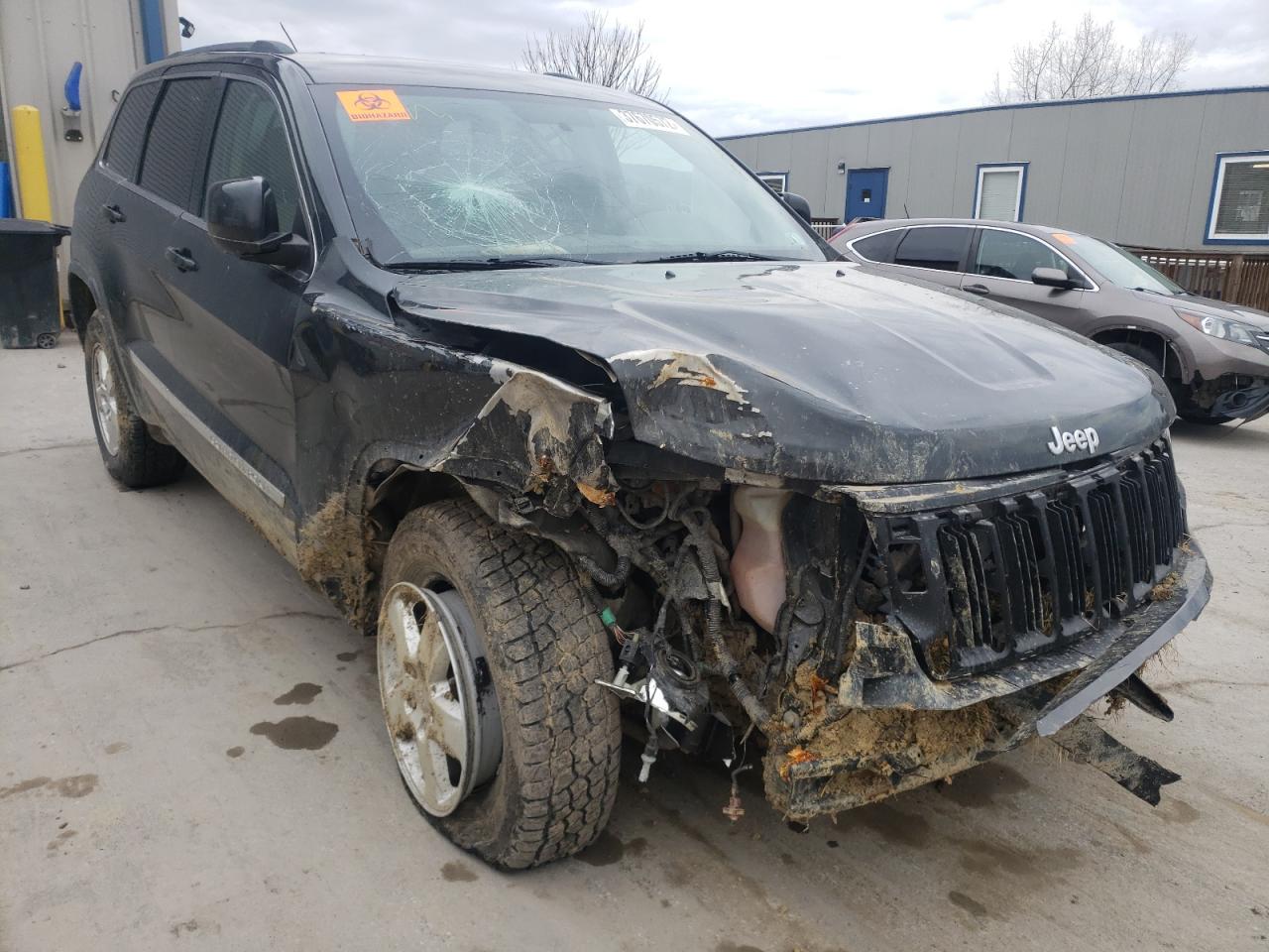 JEEP GRAND CHER 2011 with VIN 1J4RR4GG4BC547632 - Photo from auction