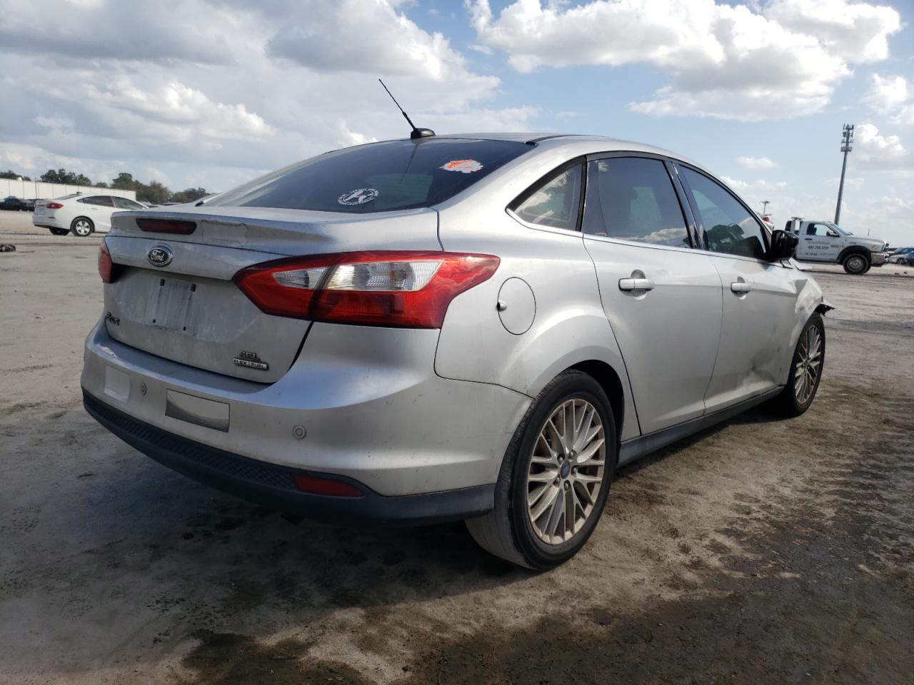 Photo 4 from auction – 2012 FORD FOCUS SEL with VIN 1FAHP3H27CL430249