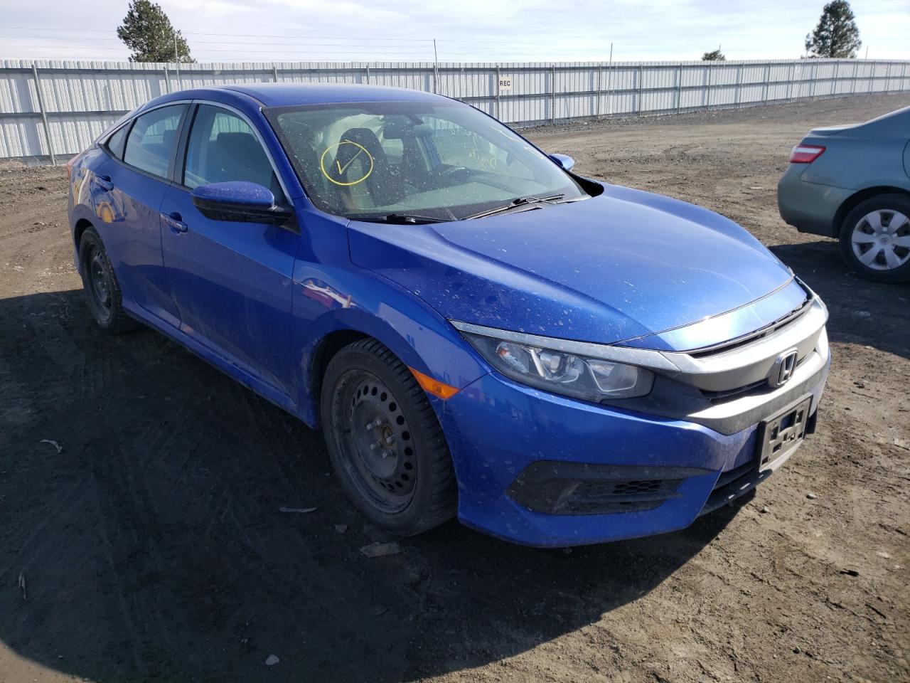Photo 1 from auction – 2018 HONDA CIVIC LX with VIN 19XFC2E55JE016852