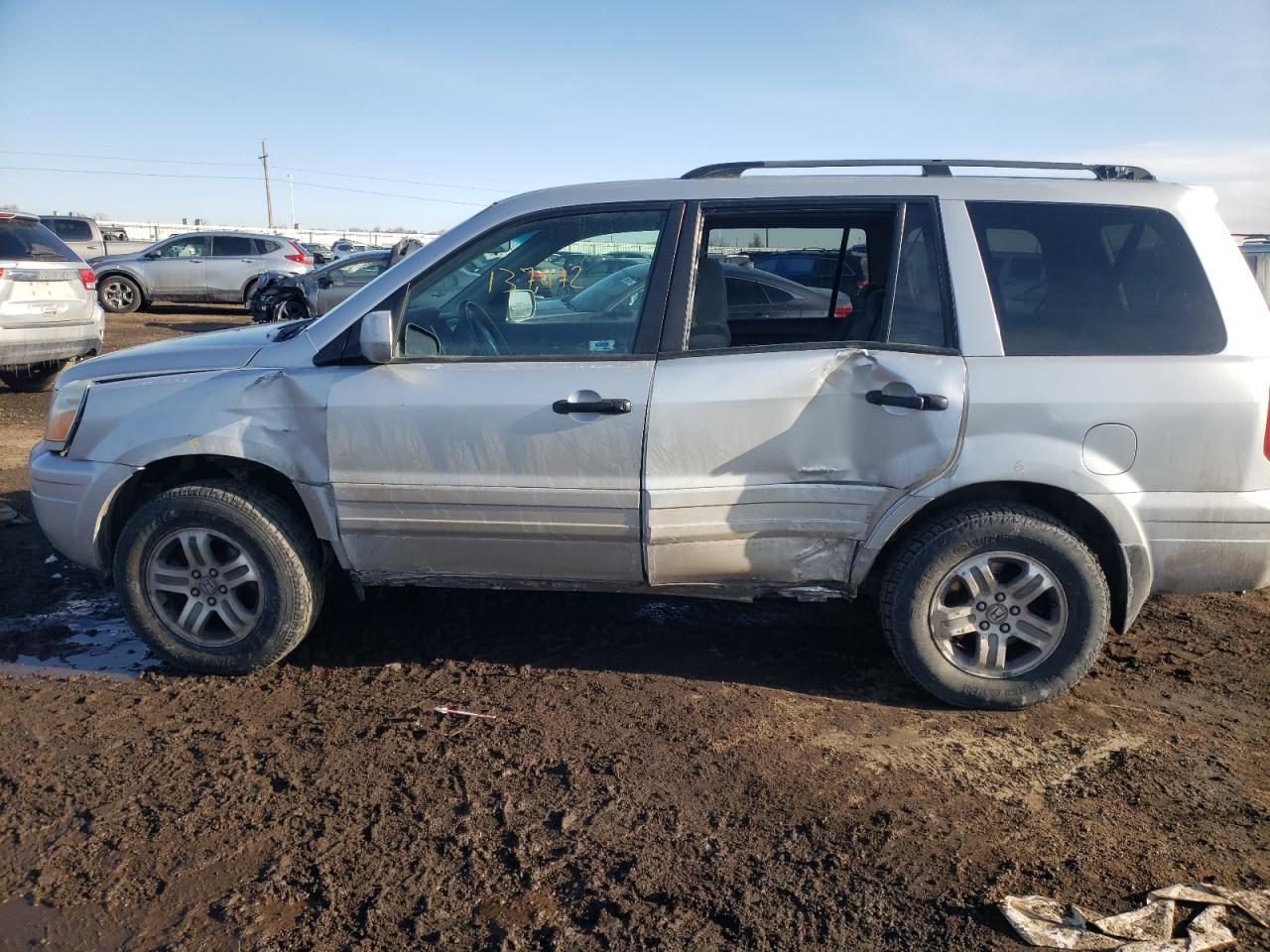 Photo 9 from auction – 2004 HONDA PILOT EX with VIN 2HKYF18434H530065