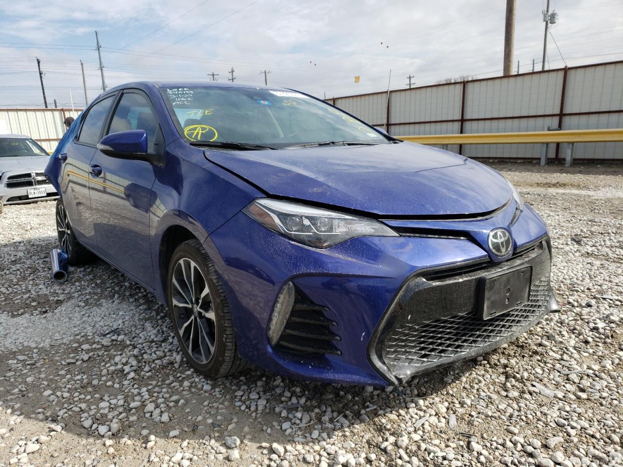 TOYOTA COROLLA L 2017 with VIN 5YFBURHE8HP658281 - Photo from auction