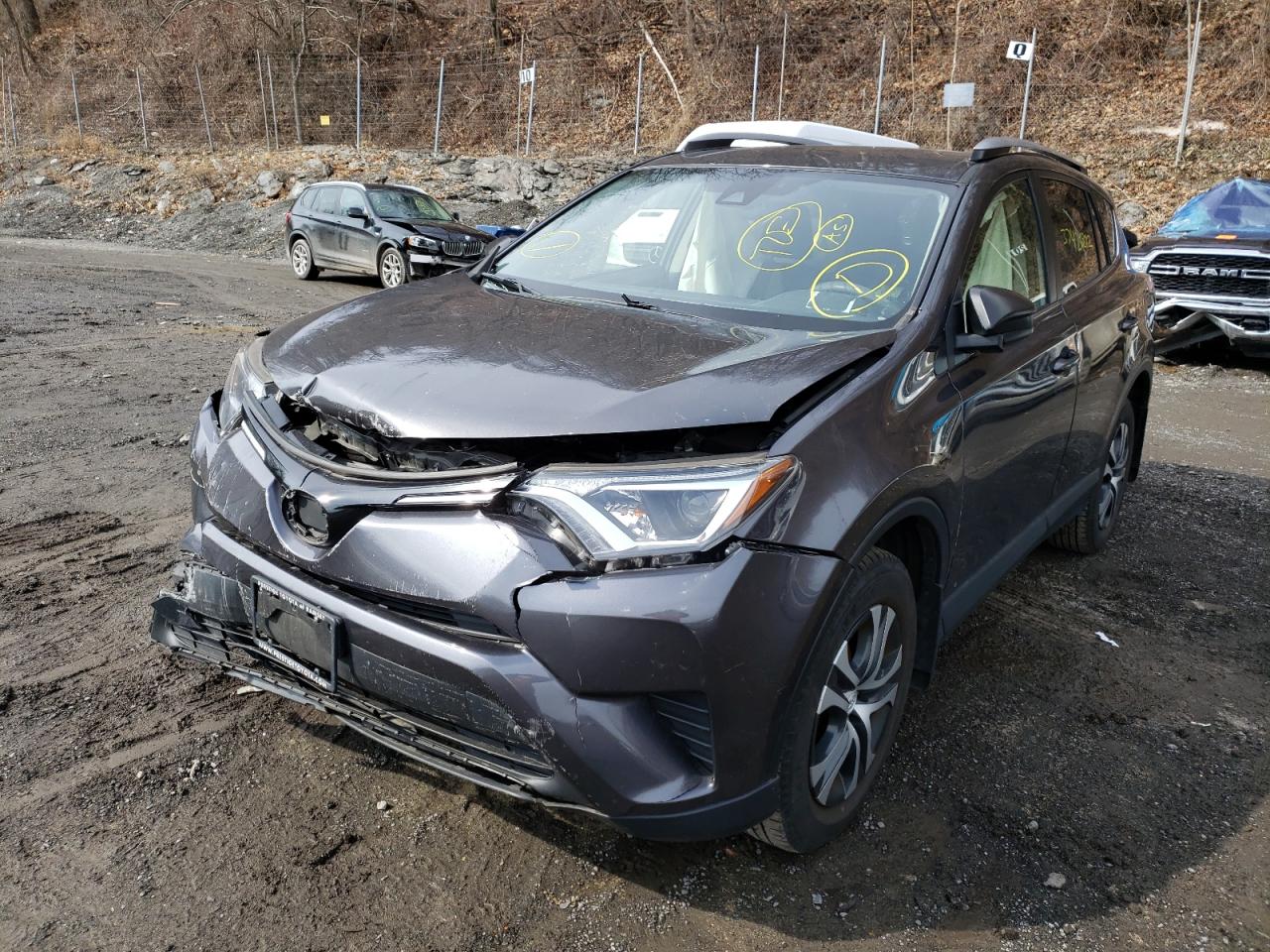 Photo 2 from auction – 2017 TOYOTA RAV4 LE with VIN JTMBFREV6HJ115580
