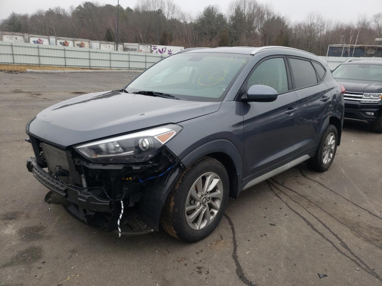 Photo 2 from auction – 2018 HYUNDAI TUCSON SEL with VIN KM8J3CA41JU677434
