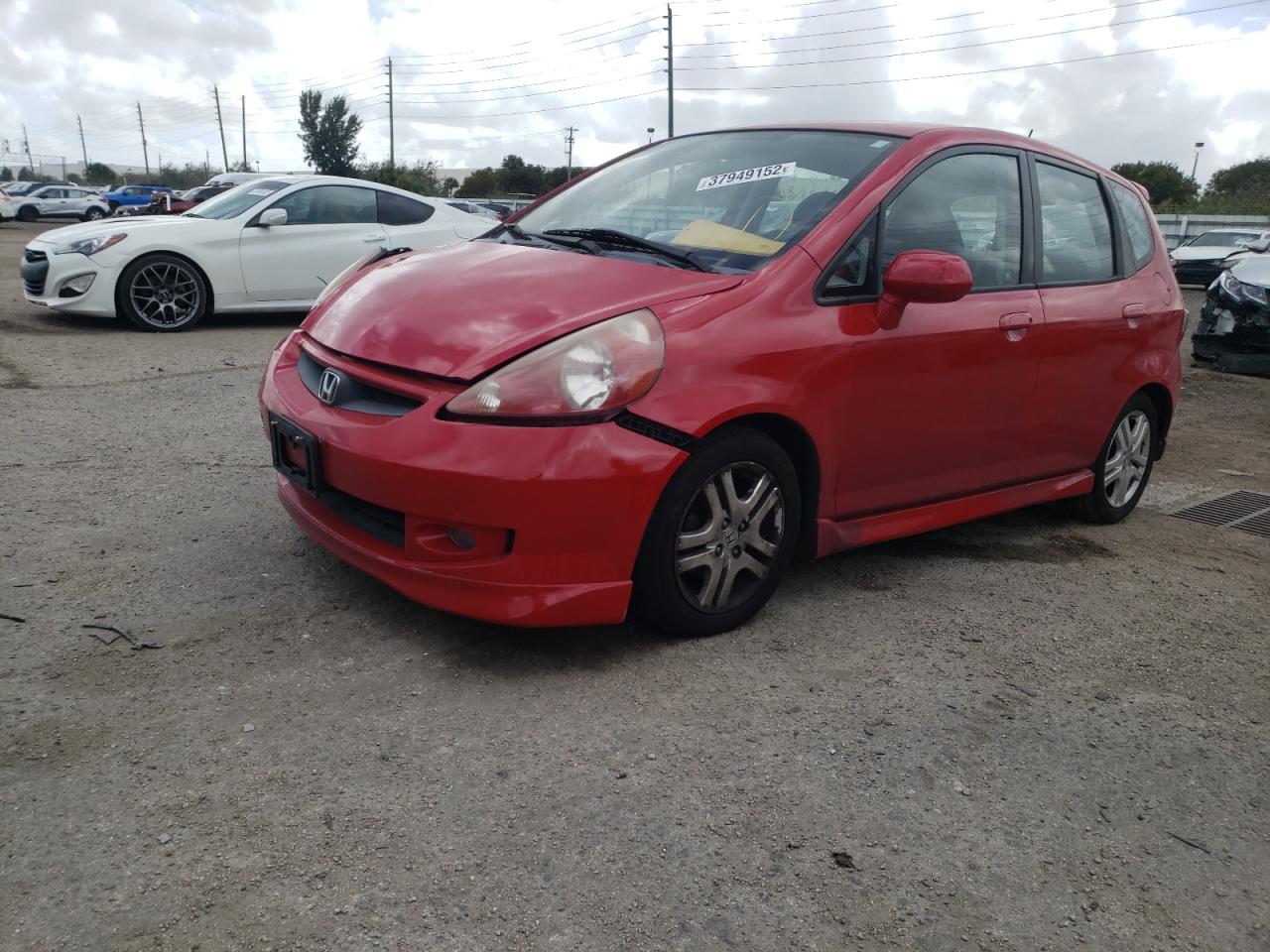 Photo 2 from auction – 2007 HONDA FIT S with VIN JHMGD38627S026481