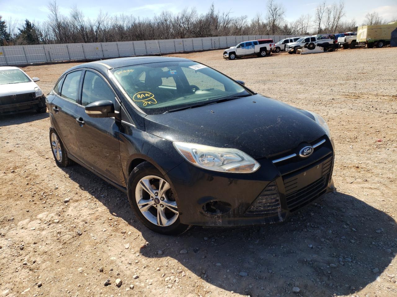 FORD FOCUS SE 2014 with VIN 1FADP3F22EL412536 - Photo from auction