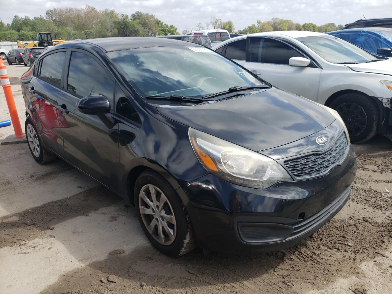 KIA RIO LX 2014 with VIN KNADM4A30E6361171 - Photo from auction