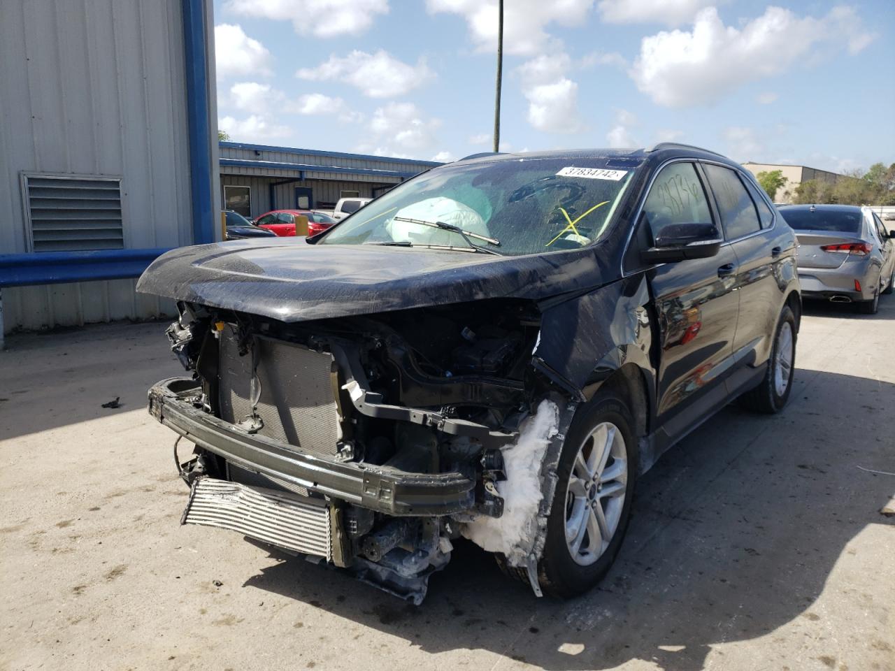 Photo 2 from auction – 2020 FORD EDGE SEL with VIN 2FMPK3J9XLBA45095