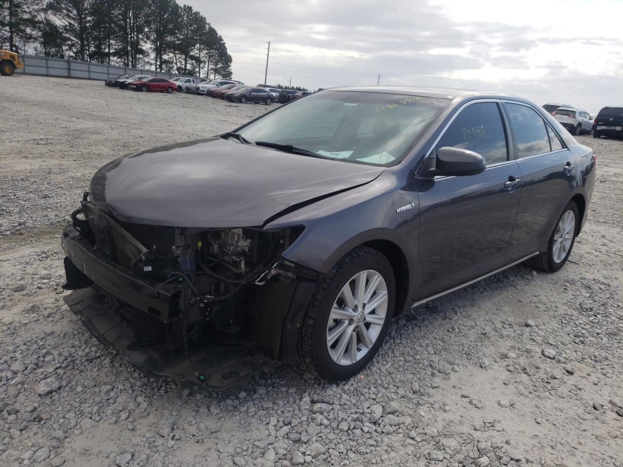 Photo 2 from auction – 2014 TOYOTA CAMRY HYBR with VIN 4T1BD1FK9EU103456