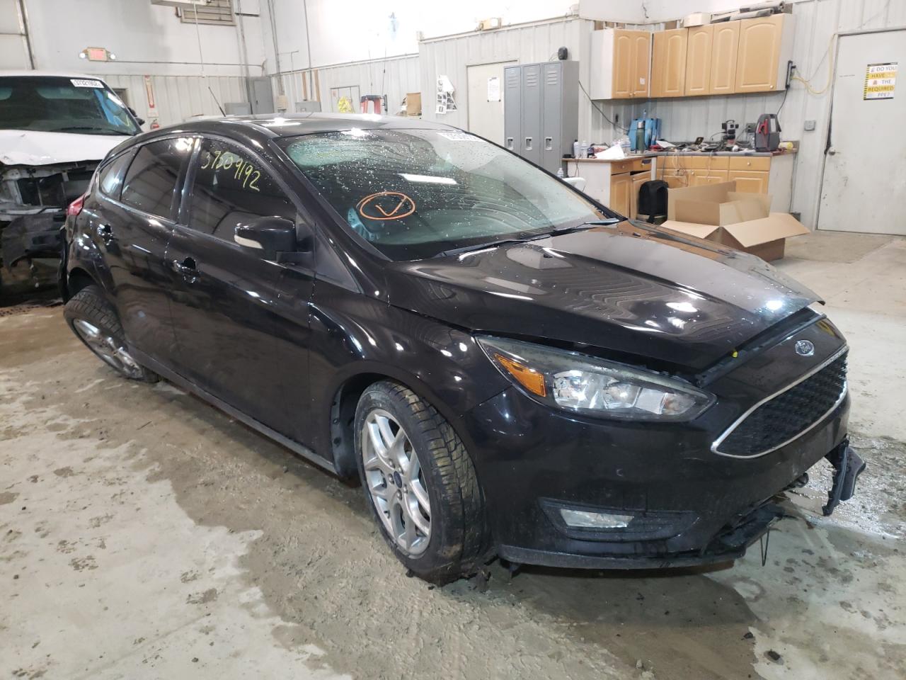 FORD FOCUS SE 2015 with VIN 1FADP3K24FL261416 - Photo from auction