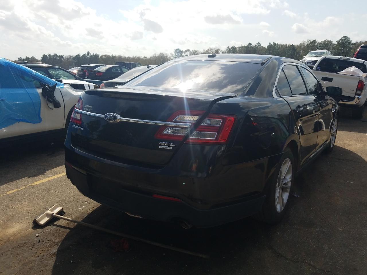 Photo 4 from auction – 2015 FORD TAURUS SEL with VIN 1FAHP2E99FG154603