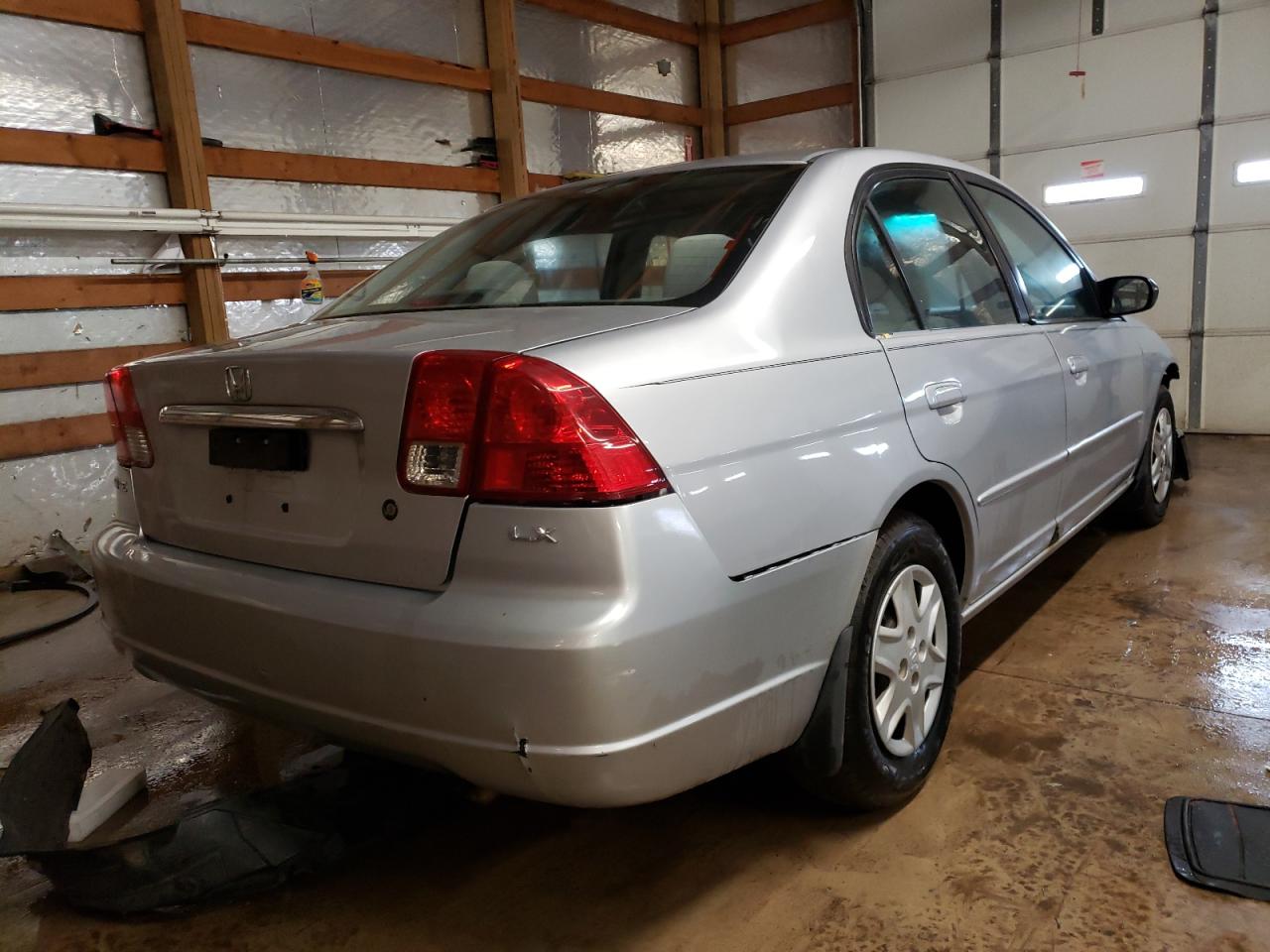 Photo 4 from auction – 2003 HONDA CIVIC LX with VIN 1HGES16533L025133