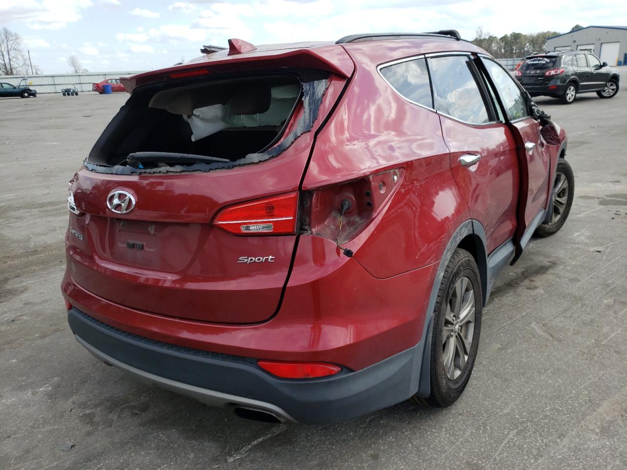 Photo 4 from auction – 2014 HYUNDAI SANTA FE S with VIN 5XYZU3LB9EG189727