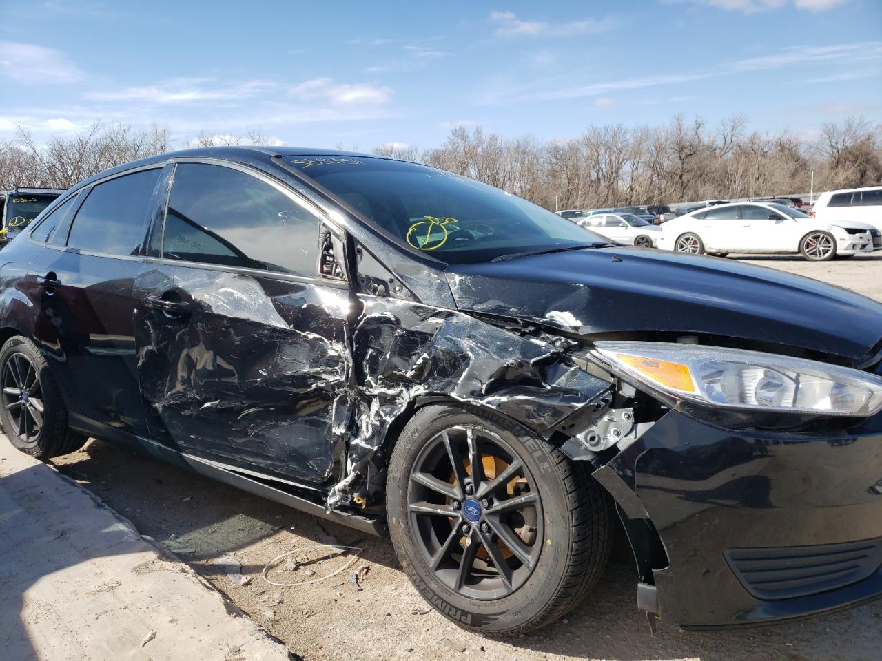 Photo 9 from auction – 2015 FORD FOCUS SE with VIN 1FADP3F25FL385351
