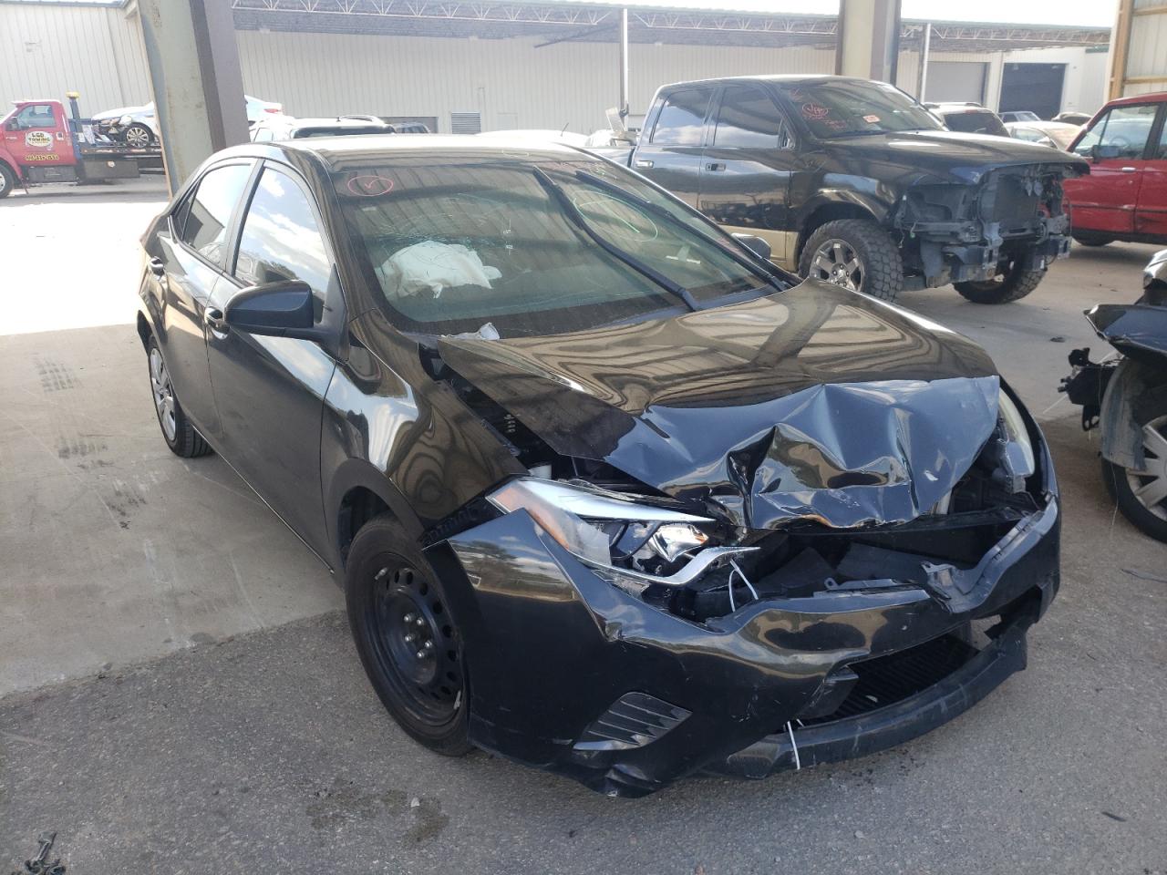 TOYOTA COROLLA L 2016 with VIN 5YFBURHEXGP393975 - Photo from auction