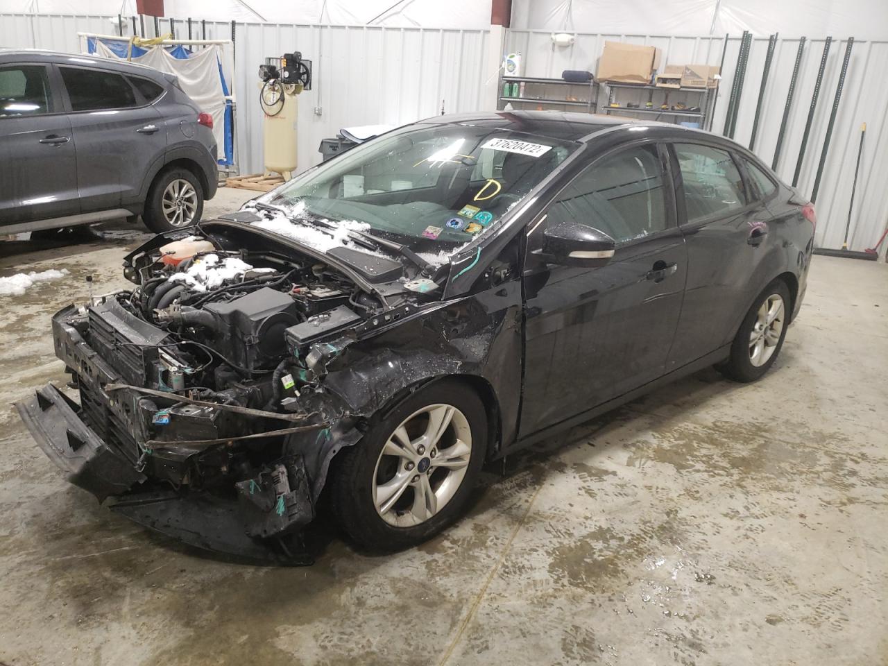 Photo 2 from auction – 2014 FORD FOCUS SE with VIN 1FADP3F27EL269342