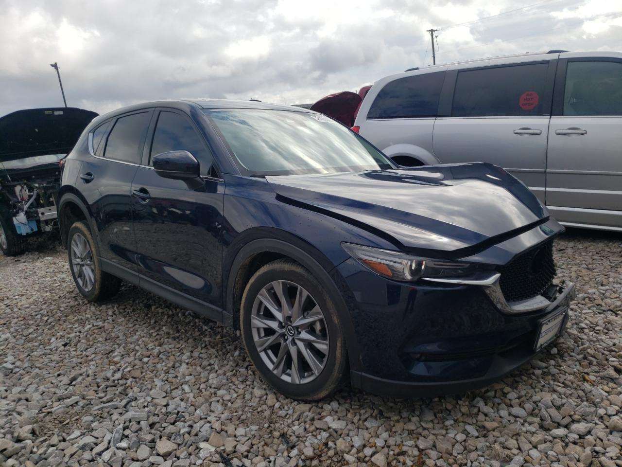 MAZDA CX-5 2020 with VIN JM3KFADM2L0817718 - Photo from auction