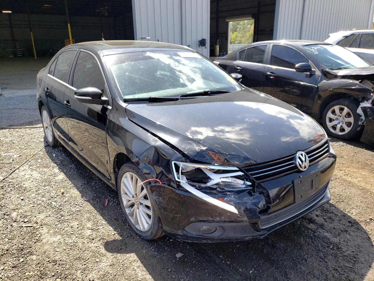 VOLKSWAGEN JETTA 2011 with VIN 3VWLX7AJ3BM351474 - Photo from auction