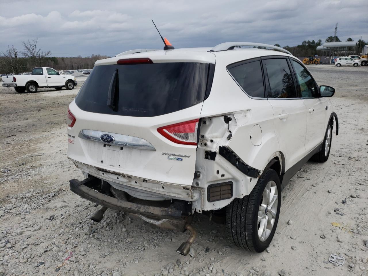 Photo 4 from auction – 2014 FORD ESCAPE TIT with VIN 1FMCU9J99EUE09774