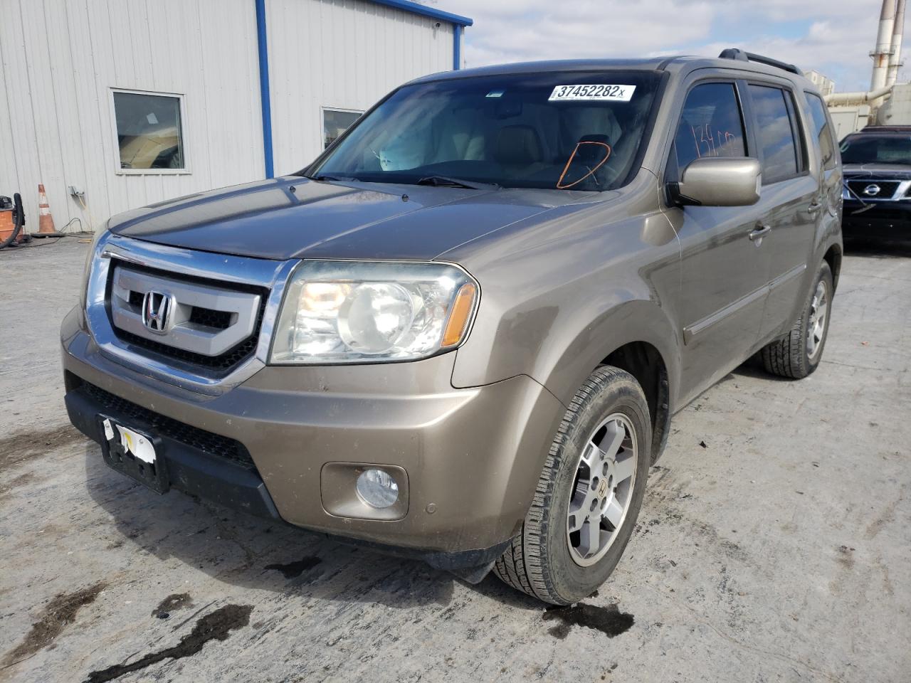 Photo 2 from auction – 2011 HONDA PILOT TOUR with VIN 5FNYF3H91BB038427