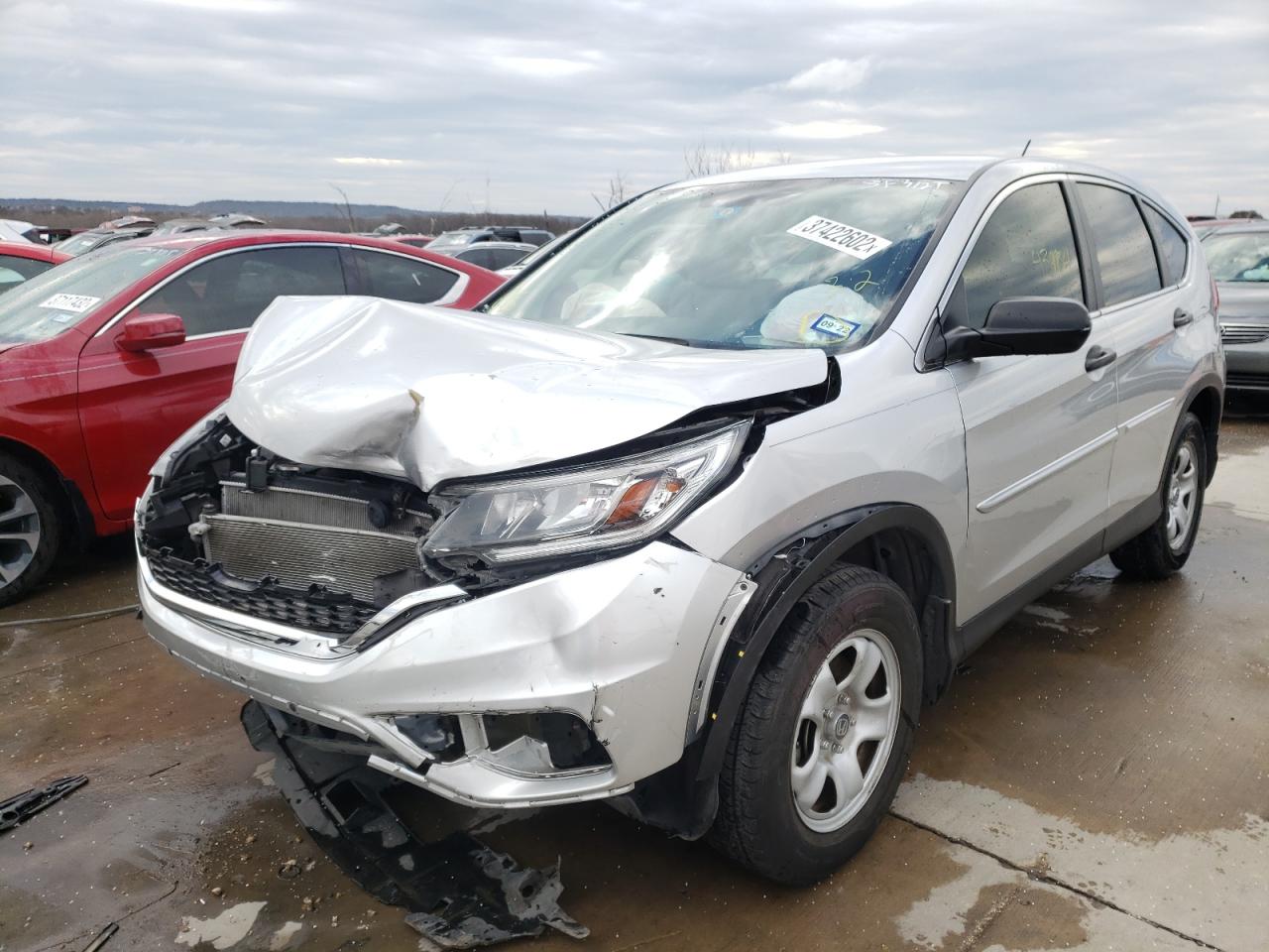 Photo 2 from auction – 2016 HONDA CR-V LX with VIN 3CZRM3H32GG707385