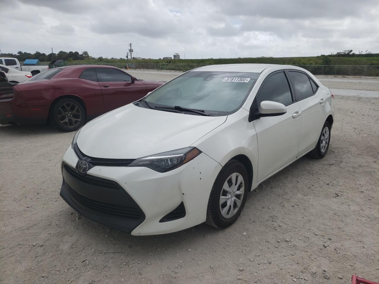 Photo 2 from auction – 2018 TOYOTA COROLLA LE with VIN 5YFBPRHEXJP803009